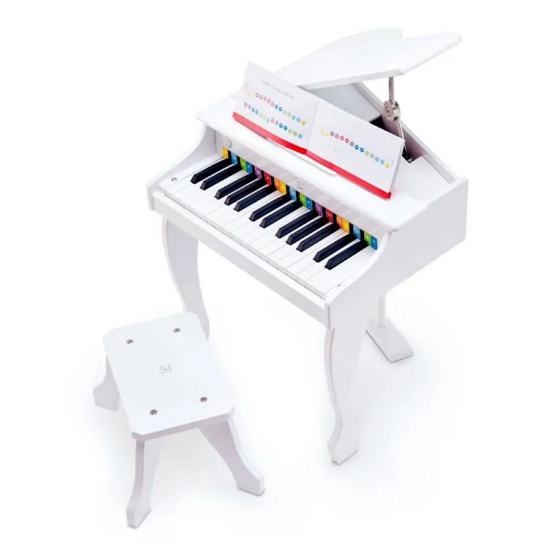 Child playing with Hape wooden musical toys