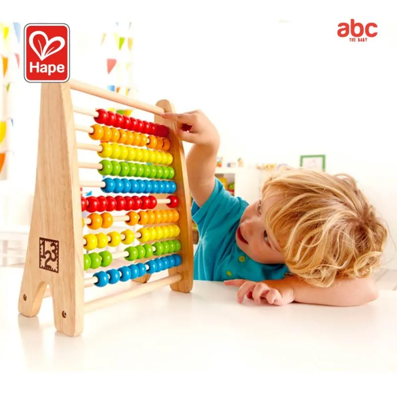 Child playing with educational toys before starting school