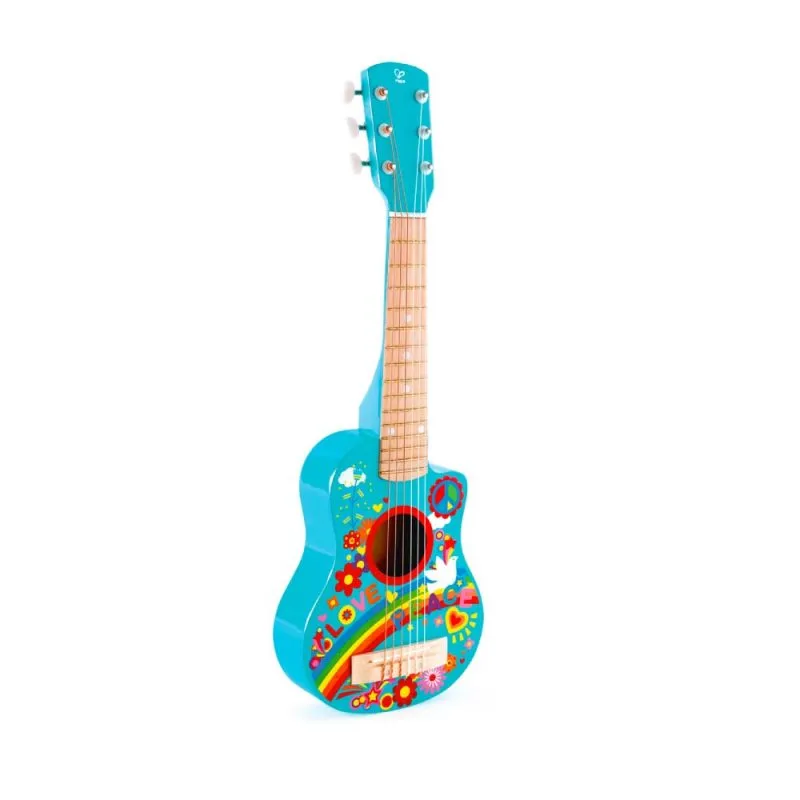 Child playing with Hape wooden musical toys