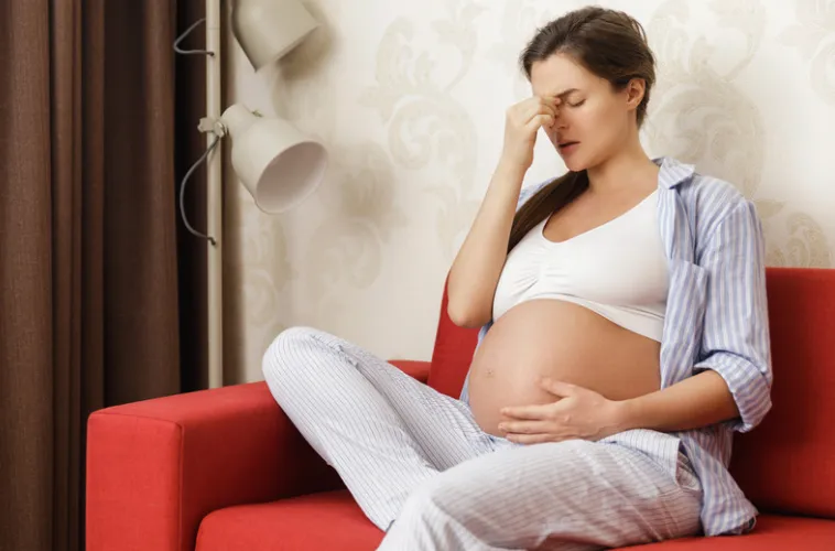 Pregnant mother having more frequent bowel movements as labor approaches