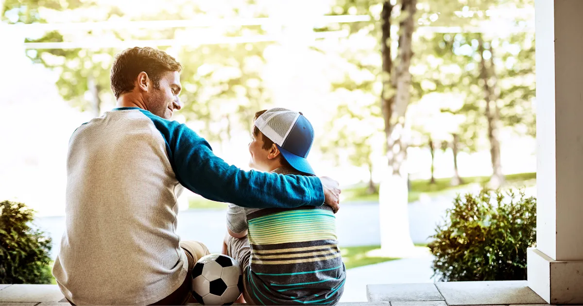 Parents encouraging their child while learning