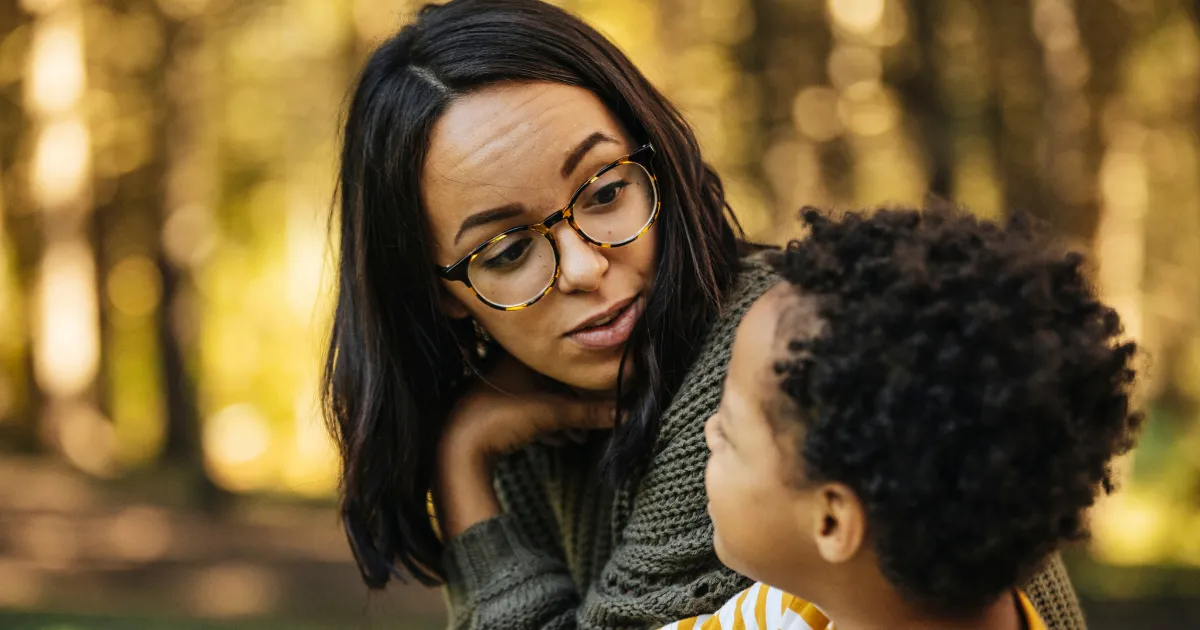 Parents correcting their child with inappropriate words