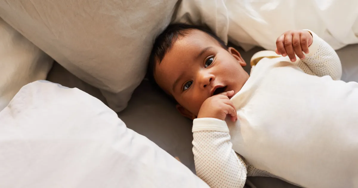 What type of mattress is suitable for a baby?